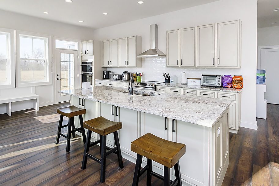 Modern Off White Kitchen by Gem Homes