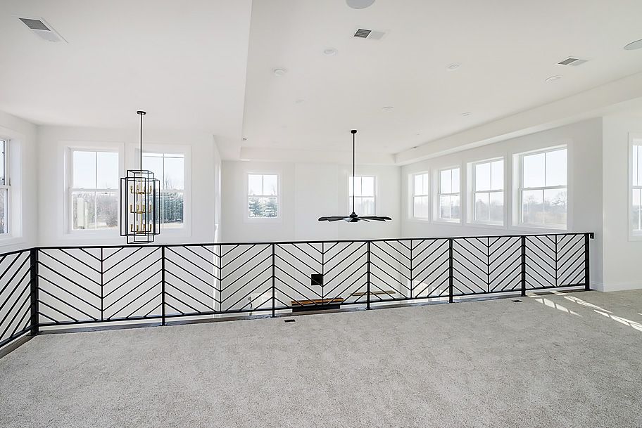 Custom Built Railing and Modern Light Fixtures