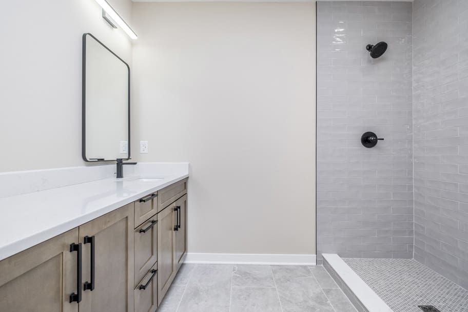 Basement Bathroom with Large Vanity and Shower