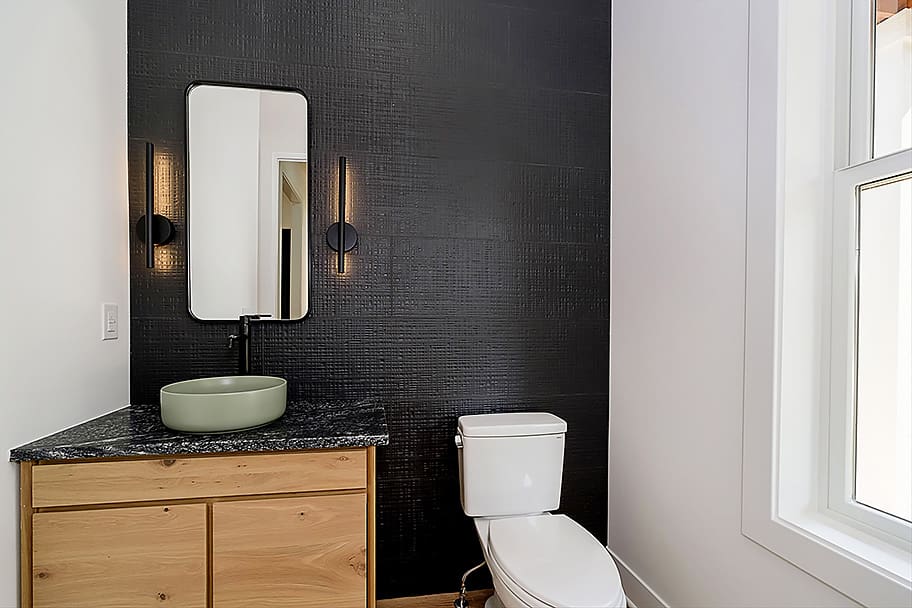 Powder Room with Black Textured Accent Wall