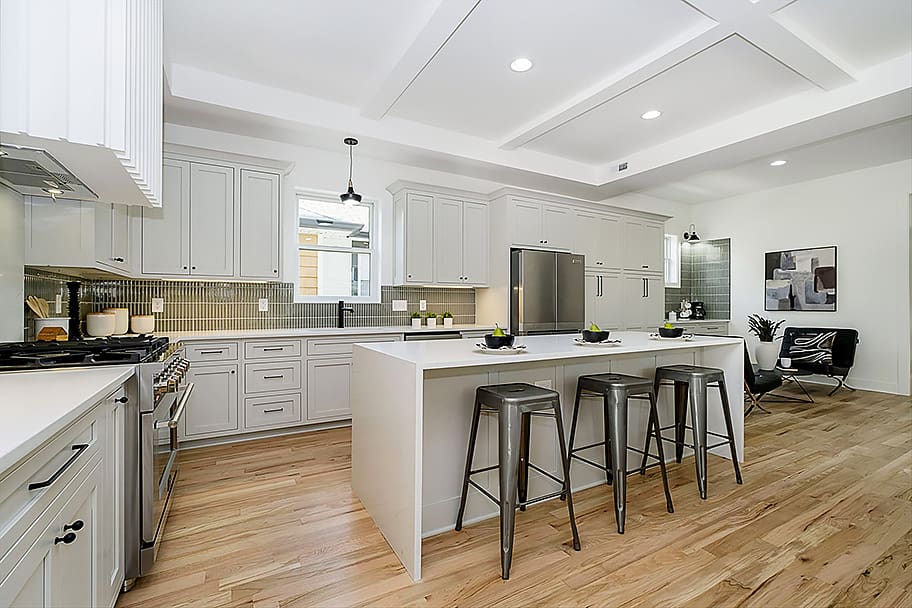 Modern White Kitchen with Green Backsplash in a New Construction Home by Gem Homes Indianapolis