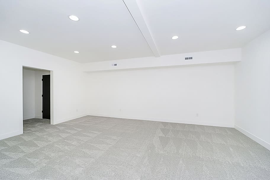 Finished Basement with Carpet and Recessed Lighting in a New Construction Home by Gem Homes Indianapolis