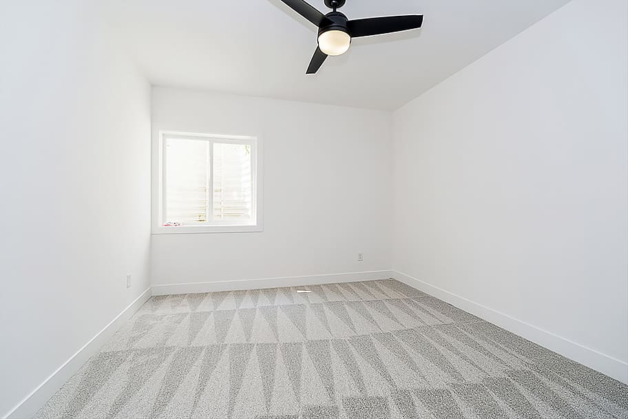 Guest Bedroom with Black Ceiling Fan in 2402 N Talbott Indianapolis