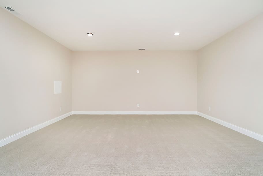Finished Basement with Recessed Lighting and Extra Room in a Custom Home by Gem Homes Indianapolis