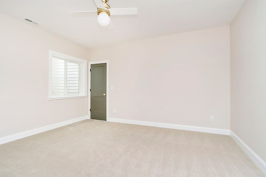 Finished Basement Room, and Green Door Closet in a Custom Home by Gem Homes Indianapolis