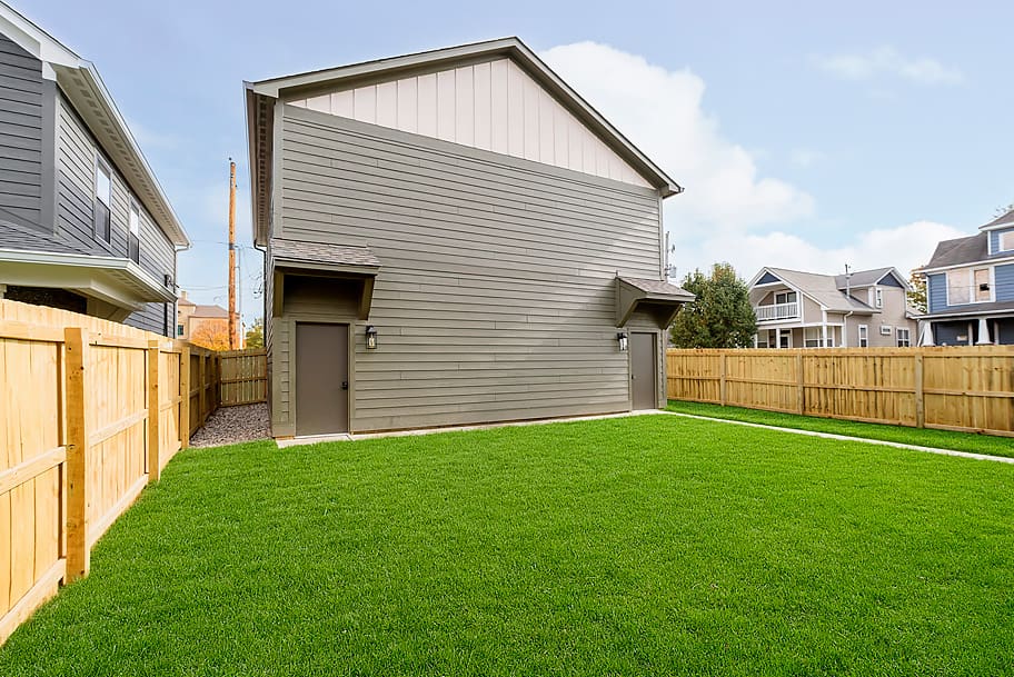 Green Detached Garage with Two Levels in a Custom Home by Gem Homes Indianapolis