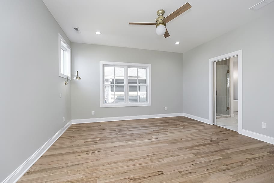 Primary Bedroom with Gray Walls Custom Home by Gem Homes Indianapolis
