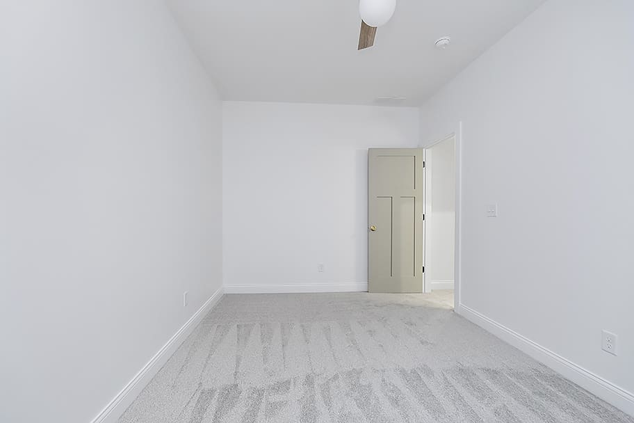 Bedroom with Green Opened Door